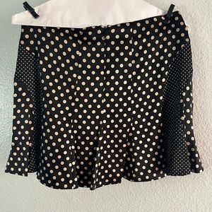 Polka dot mini skirt size small Bebe brand